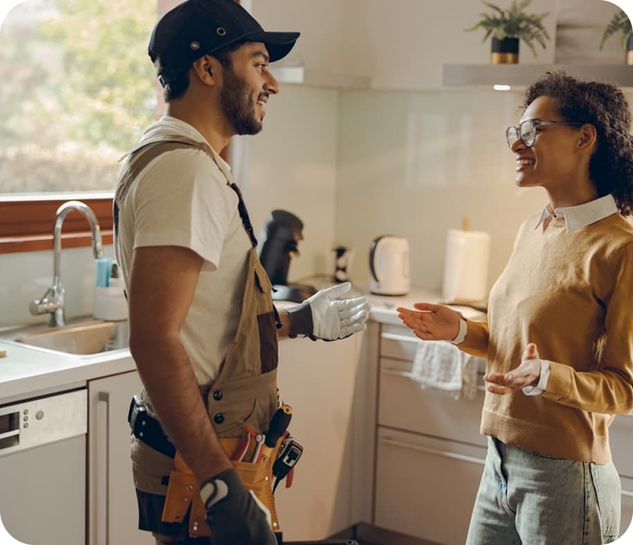 A homeowner discussing a kitchen renovation with a contractor
